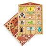 An educational wooden toy "The Bug Hotel" featuring compartments with illustrated, colorful wooden bugs like a butterfly, bee, and dragonfly, along with leaves and a roof designed to look like a ladybug.
