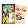 The "Your Story of Little Red Riding Hood" set includes wooden figures—Red Riding Hood, the wolf, grandma, a tree, and a house—in a plywood box for imaginative woodland storytelling.