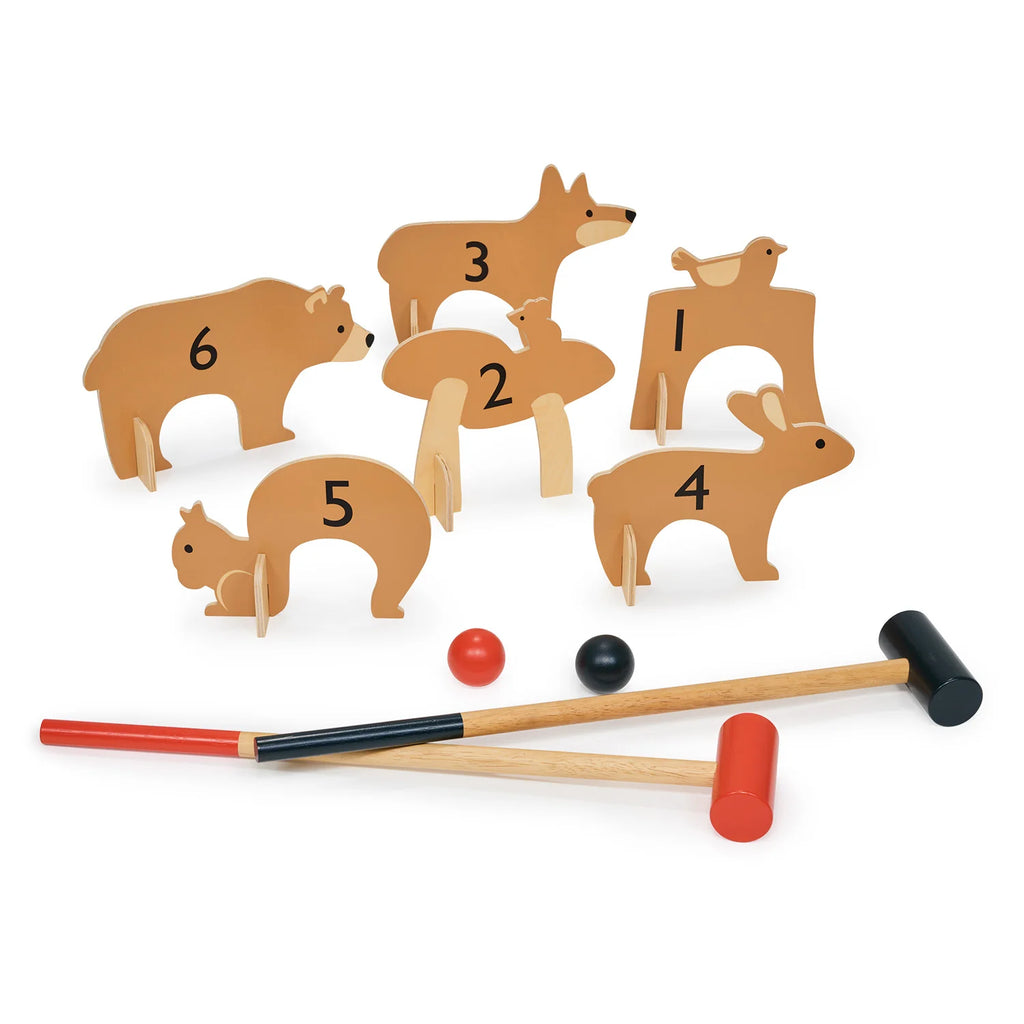 The Woodland Indoor Croquet Set is a delightful children's game with animal-shaped gates: bird on deer (1), mushroom (2), deer (3), rabbit (4), squirrel (5), and bear (6). It features one red and one black wooden croquet mallet, plus matching balls.