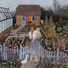 A woman, her child on her hip, stands elegantly in a garden brimming with flowers, her figure beautifully defining the scene for the Toverlux Lamp. A wicker basket rests in her hand as a white duck waddles charmingly near the picket fence of the small brick house adorned with a thatched roof. On the left side of this picturesque setting, a greenhouse crafted from translucent material shimmers under sunlight.