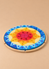 The Grimm’s Sparkling Mandala Sun Creative Puzzle is a circular wooden puzzle with a sunburst pattern of colorful triangular blocks, each featuring a faceted jewel accent, designed to support fine motor skills.