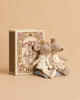 Maileg Royal Twin Mice In Matchbox, Little Sister and Little Brother, featuring two royal twin mice plush dolls wearing crowns and ornate outfits sitting on a blue patterned cushion next to an upright matchbox with an illustration of two mice.