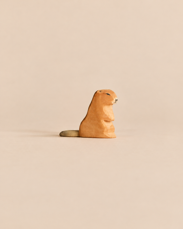 Handcrafted wooden Ostheimer Beaver - Sitting figurine shown in a seated position.