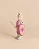 Handcrafted wooden Ostheimer Red Knight - Standing in pink armor holding a sword and a shield with a flower motif for imaginative play.