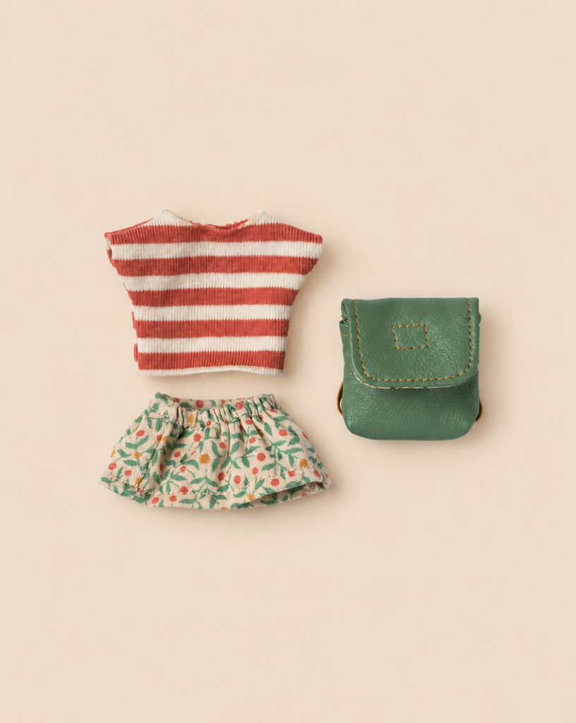Maileg Clothes and Bag, Big Sister Mouse - Green consisting of a red and white striped shirt, a floral print skirt, and a small green backpack.