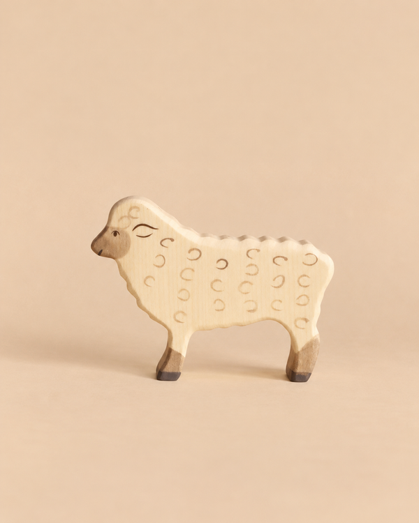 Holztiger Sheep, Standing, a handcrafted wooden figurine with painted details.