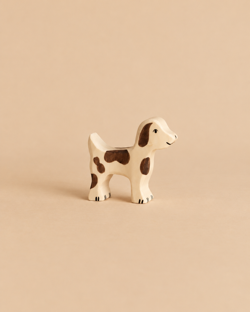 Holztiger Small Farm Dog handcrafted from wood with brown spots.