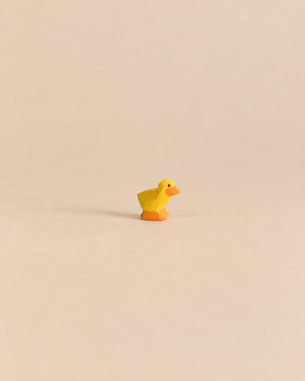 Handcrafted Ostheimer Chick, Yellow figurine in yellow and orange.