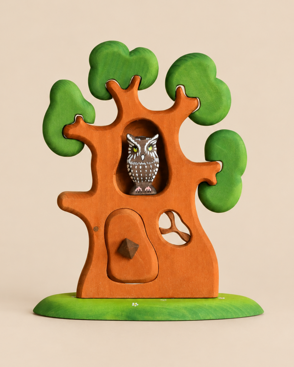 Bumbu Handmade Wooden Ancient Oak Tree with Owl Set, featuring green foliage, a hinged door, and a small owl figurine perched in a hollow.