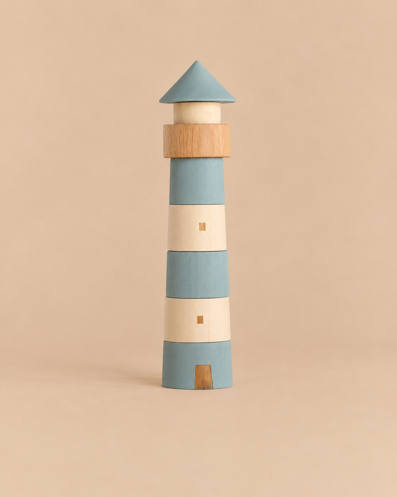 The Sabo Concept Lighthouse is a stackable wooden playset designed as a lighthouse, featuring segments in blue and natural wood tones for a maritime adventure.