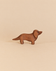 Small handcrafted wooden Ostheimer Dog - Dachshund figurine.