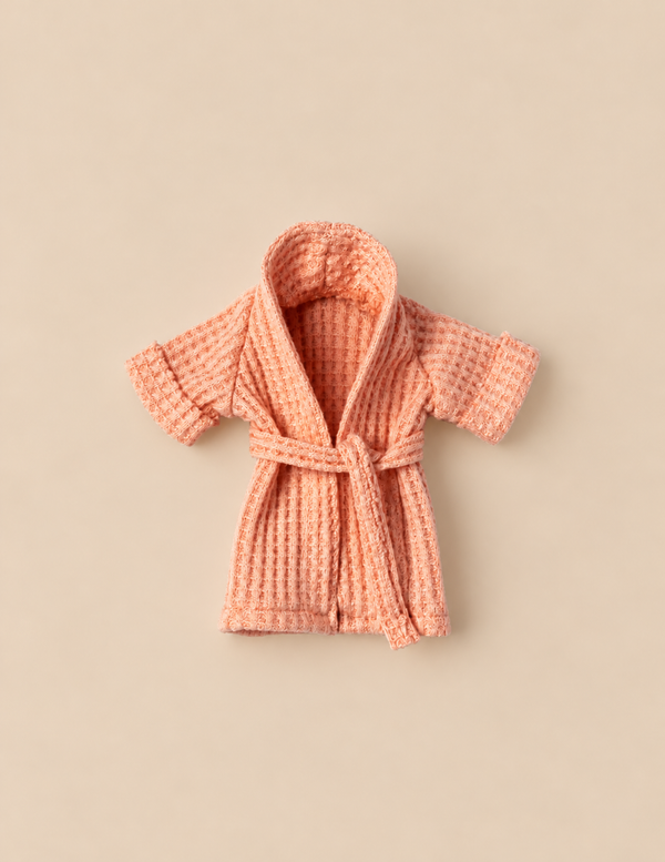 Maileg Extra Clothing: Bathrobe - Coral in a waffle-textured miniature soft design with a matching tie belt.
