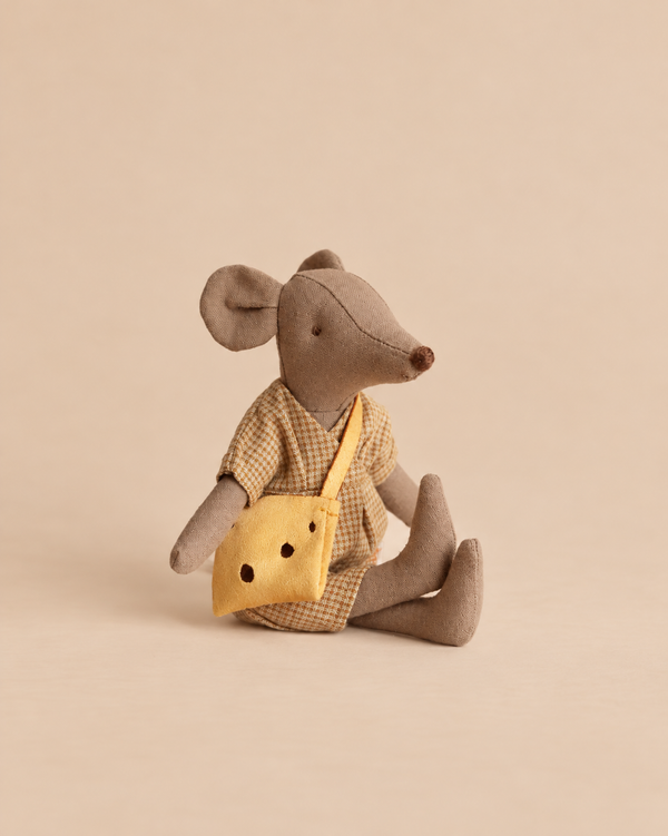 A Maileg Mum Mouse In Checkered Dress - Light Brown wears a yellow crossbody bag.
