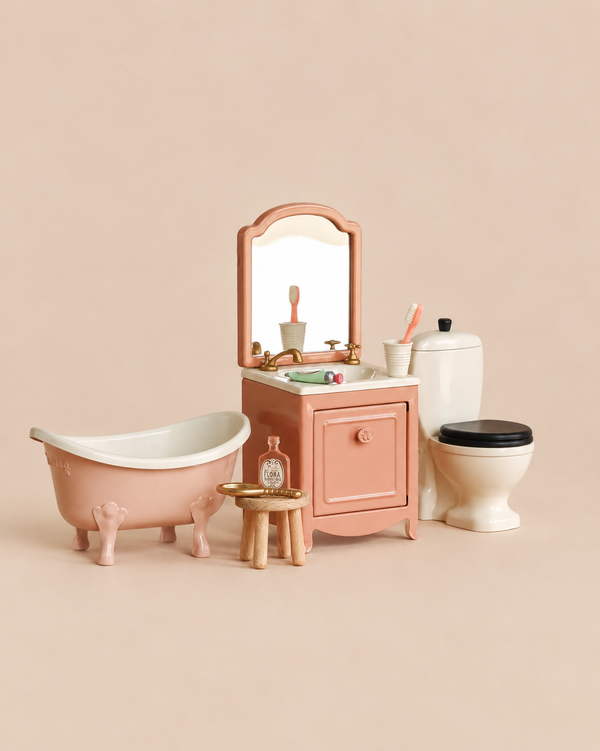 Maileg Bathroom Set featuring a bathtub, sink dresser, toilet, small wooden stool, and bathroom accessories.