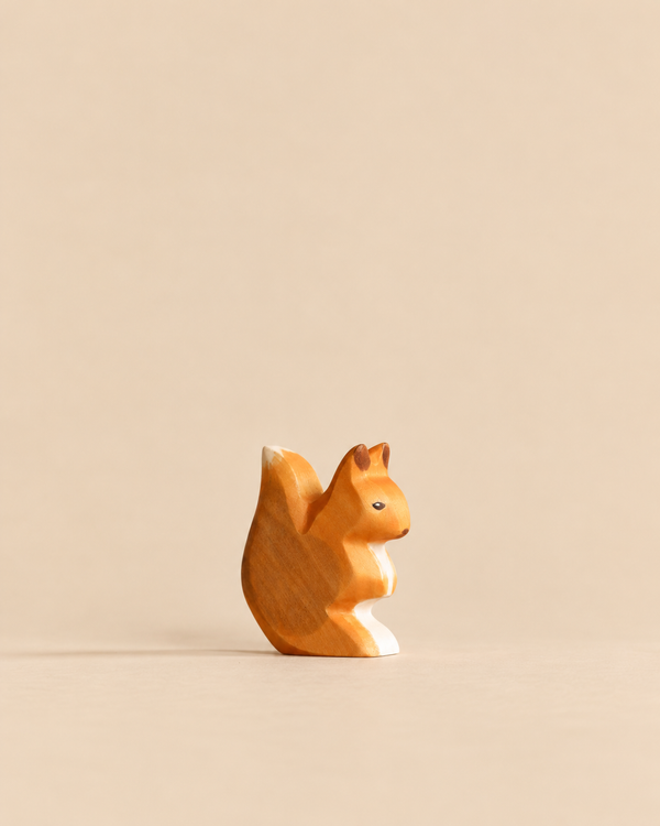 Handmade Holzwald Squirrel figurine made of wood with brown and tan painted details, perfect for imaginative play.