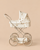 Konges Sloejd Doll Pram - Lemon in cream with a yellow lemon print and large wheels.
