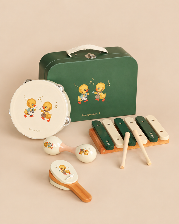 Konges Sloejd Music Set - Green, featuring a carrying case, tambourine, xylophone with two mallets, two maracas, and a castanet, all decorated with duckling illustrations.