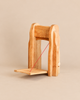 Ostheimer Drawbridge Gate, a handcrafted wooden toy with a folding drawbridge held by a red string.
