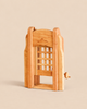 Ostheimer Portcullis handcrafted wooden toy with a sliding gate mechanism and a small side crank for imaginative play.