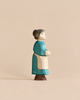 Handmade Holzwald Grandmother figurine, hand-carved from wood and wearing a blue dress with a cream apron.