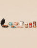 Maileg Waffle Set, Mouse, featuring a miniature toy waffle iron with heart-shaped waffles, two tea cups and saucers, a pitcher, and jars of chocolate spread, jam, and hot chocolate.