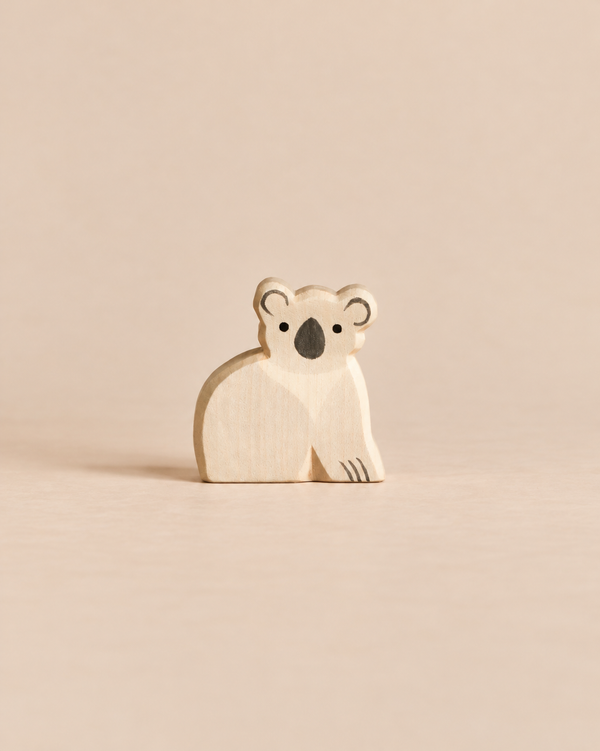 An Ostheimer Koala, a small, handcrafted wooden figurine.