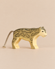 Hand-painted Handmade Holzwald Snow Leopard wooden toy figurine with a rope tail and detailed markings.