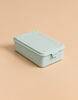 Glacier Toyo - Steel Stackable Storage Box T-150, a light blue steel toolbox with a lidded top and a side latch, perfect for organizing art supplies.