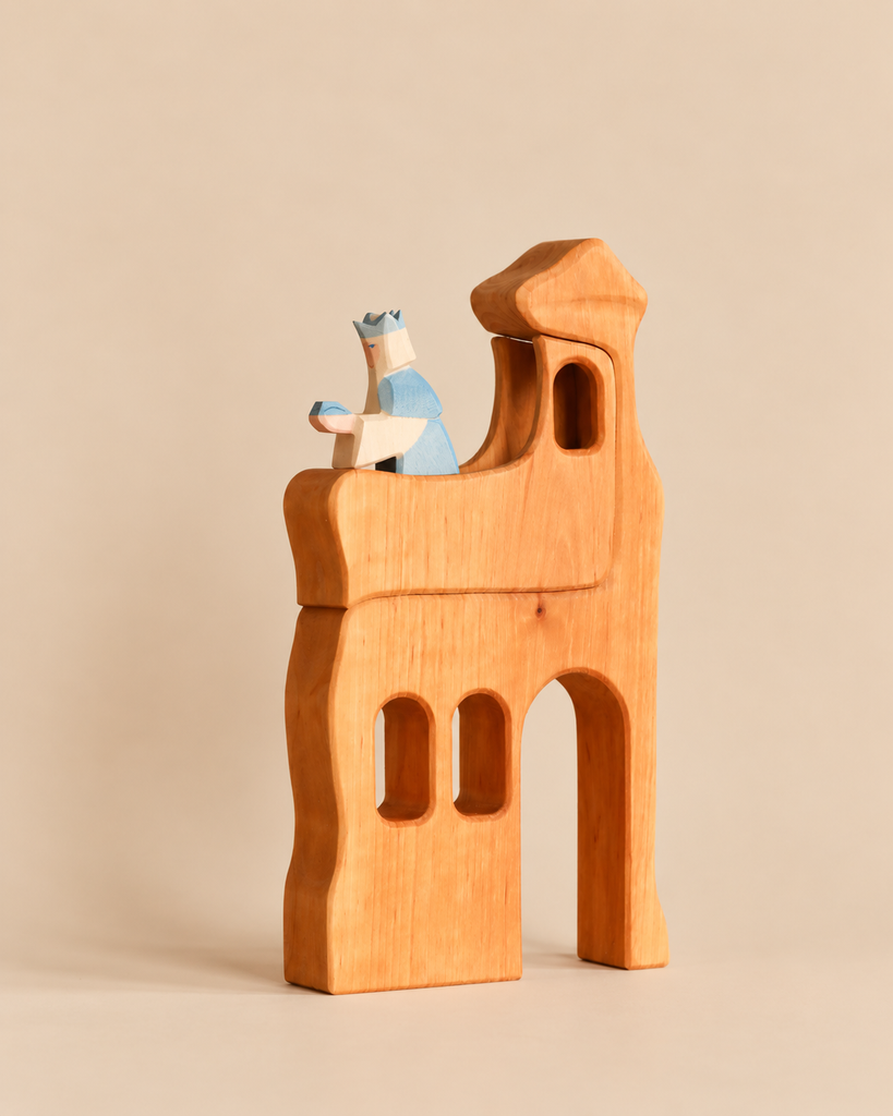 An Ostheimer Lookout - Large, handcrafted as a wooden watchtower toy with a king figure sitting on the balcony for imaginative play.