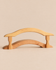Ostheimer Bridge with Railing, a handcrafted wooden toy bridge with an arched top rail supported by two upright posts, perfect for imaginative play.