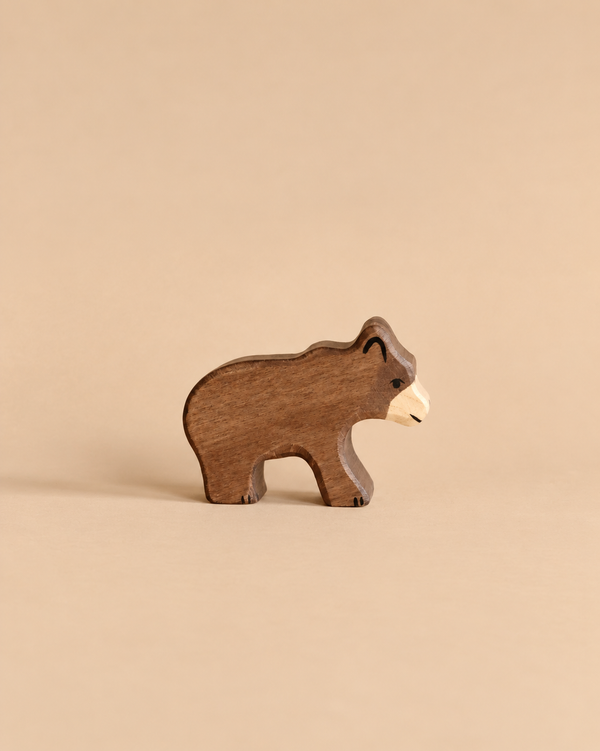 Holztiger Small Brown Bear, a small handcrafted wooden toy bear in a standing position, perfect for open ended play.