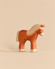 Handmade Holzwald Farm Animals Set wooden toy horse with a brown and cream coat, crafted in the style of sustainable Holzwald animals.