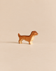 Handmade Holzwald Dog - Dachshund figurine with a brown back and cream-colored legs, perfect for imaginative play.