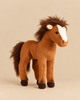 A Steiff Chayenne Horse plush featuring a brown coat, a white blaze on its face, and a dark brown mane and tail.