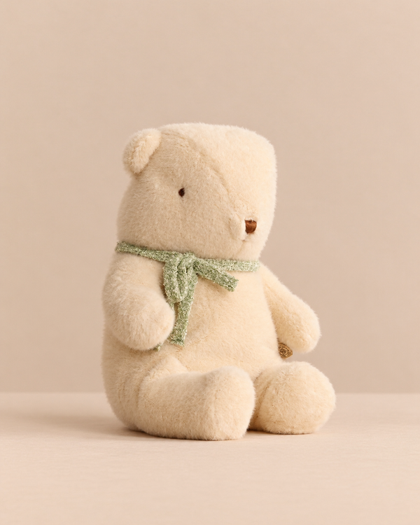 Maileg Teddy Bear Plush, Medium - Off White, sitting upright in a thin green scarf.