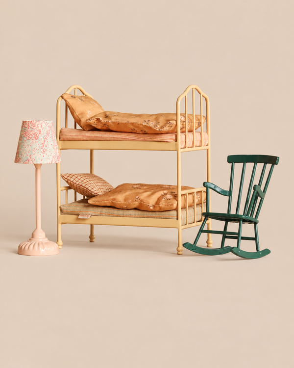 Maileg Bunk Bed Bedroom Set featuring a bunk bed with patterned bedding, a vintage floor lamp with a floral shade, and a small green rocking chair.