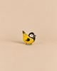 Handcrafted wooden Ostheimer Bird - Goldfinch with a yellow breast, black head markings, and white cheek patches.