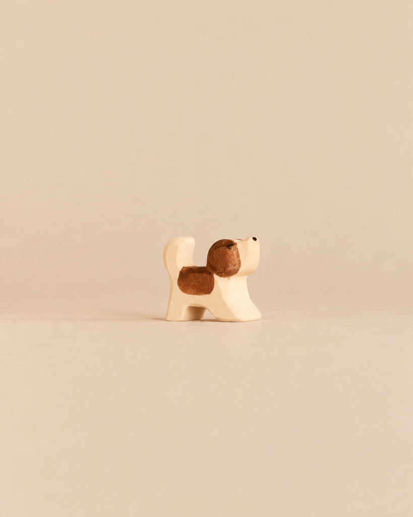 Small Ostheimer Dog - Saint Bernhard, Small - Head Up wooden figurine with brown spots on its head and back, depicted with its head looking upward.
