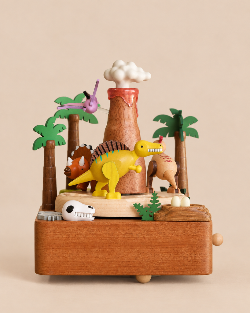 A Wooden Volcano & Dinosaur Music Box featuring a central volcano surrounded by miniature palm trees and various dinosaur figures.