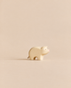 Handmade Holzwald Piglet, a small wooden toy with a painted pink snout.