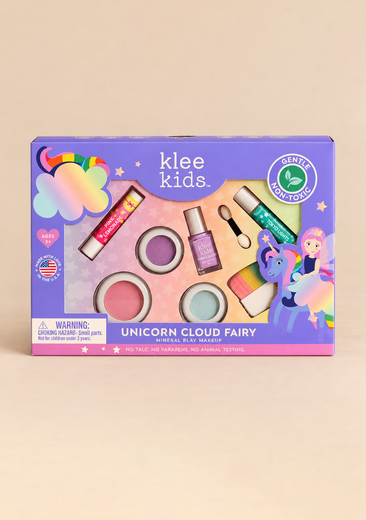 Klee Naturals Deluxe Makeup Kit - Unicorn Cloud Fairy, a children’s non-toxic makeup set in a purple box containing two lip balms, nail polish, two eyeshadow pots, a blush pot, and an applicator, decorated with a unicorn and fairy illustration.