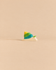Holztiger Snail handcrafted wooden toy with a yellow and green shell.