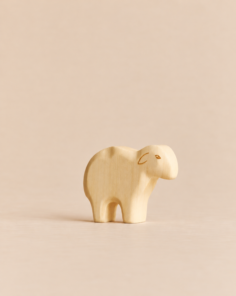 Handmade wooden figurine of a standing sheep from the Handmade Holzwald Shepherd & Farm Animals Set.