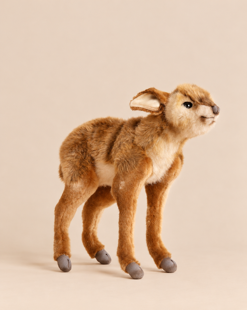 A realistic Baby Antelope Stuffed Animal standing in profile, crafted in the style of HANSA animals.