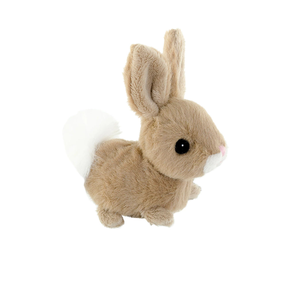 Introducing the Bukowski - Hera Bunny Bag Charm: a small, plush toy bunny keychain featuring light brown fur, a white fluffy tail, large upright ears, and black button eyes. Facing to the right on a white background, this adorable charm is perfect as a soft plush toy or a charming backpack accessory.