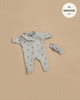Minikane 11" Doll Clothing | Camille Onesie & Headband in Ribbed Cotton - Beige Hearts: A gray ribbed long-sleeve romper with ruffled collar and heart pattern, plus matching headband. Displayed on tan background. Text reads "fits 11\" Babies dolls".