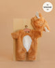 The Minikane 13" Doll Clothing | Bambi Costume is a fluffy orange-brown outfit with a white belly, matching hood with ears and white spots, designed for 13 inch dolls. Made in France, it's displayed on a small wooden board.