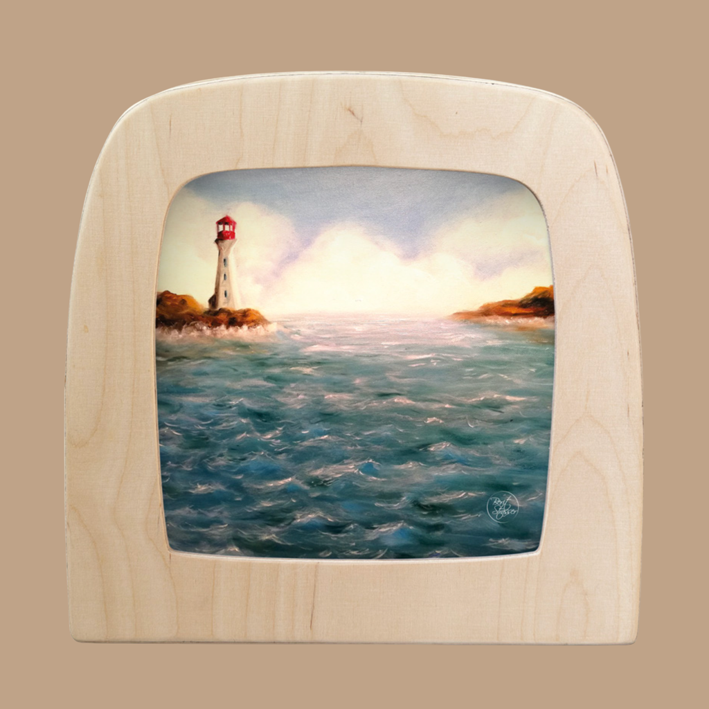 The Silhouette Only - Lighthouse for Toverlux Lamp features a striking lighthouse with a red top on a rocky shore, overlooking choppy blue sea beneath cloudy skies, captured in vibrant detail to enhance your lamp’s ambiance.