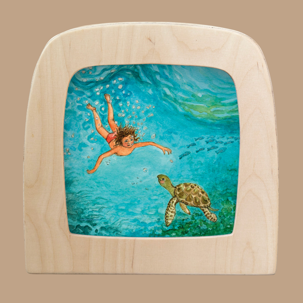 The Silhouette Only - Turtle for Toverlux Lamp features a child's underwater journey toward a turtle silhouette, surrounded by fish and bubbles in a tranquil blue ocean scene.