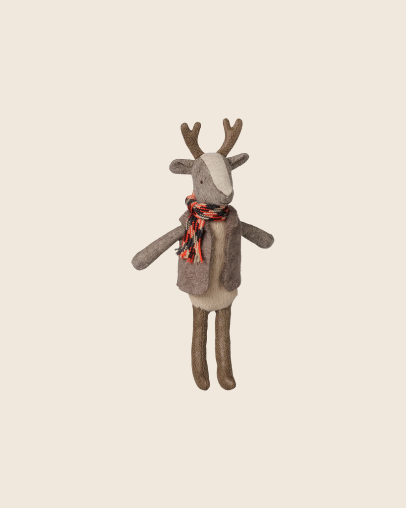 The PRE-ORDER: Maileg Reindeer, Father features brown antlers, a gray linen body, beige face, furry vest, and red and black plaid scarf. This stuffed animal stands upright against a plain light background. Estimated arrival early November.